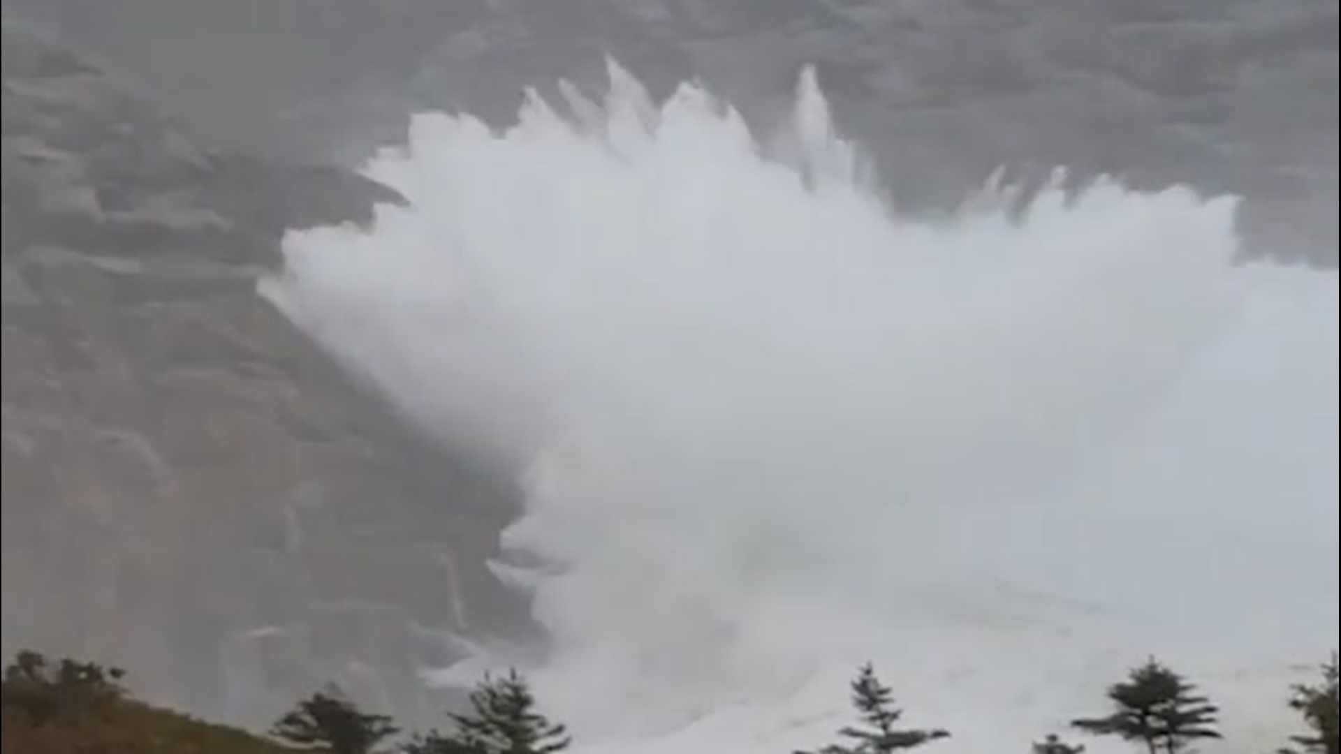 Huge waves churned by Teddy crashed into the rocky shoreline in Ketch Harbour, Nova Scotia, on Sept. 22. Water was seen launching high into the air.