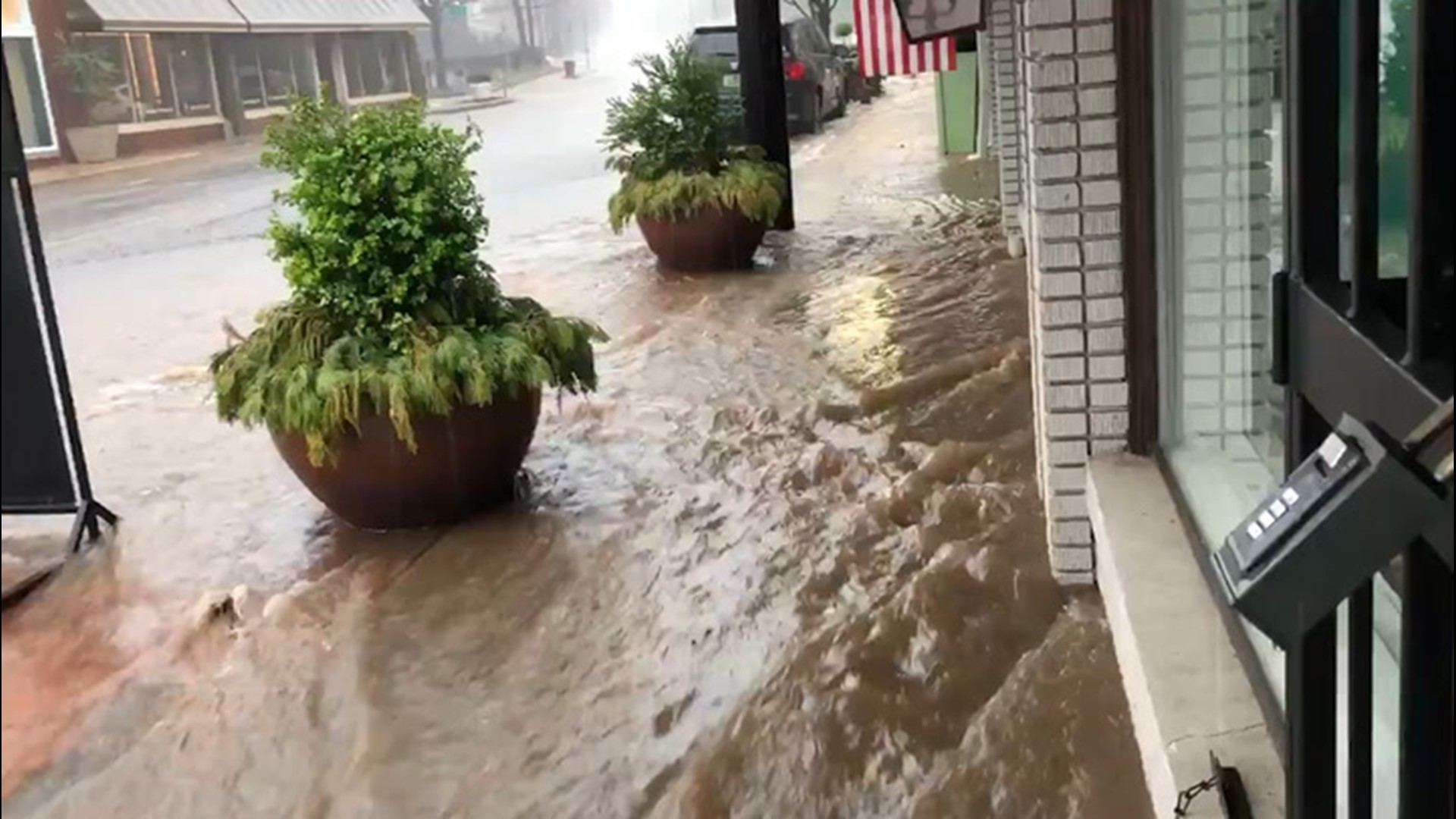 Floodwaters flowed down the streets of Birmingham, Alabama, on Monday as rounds of drenching thunderstorms tracked through the South.