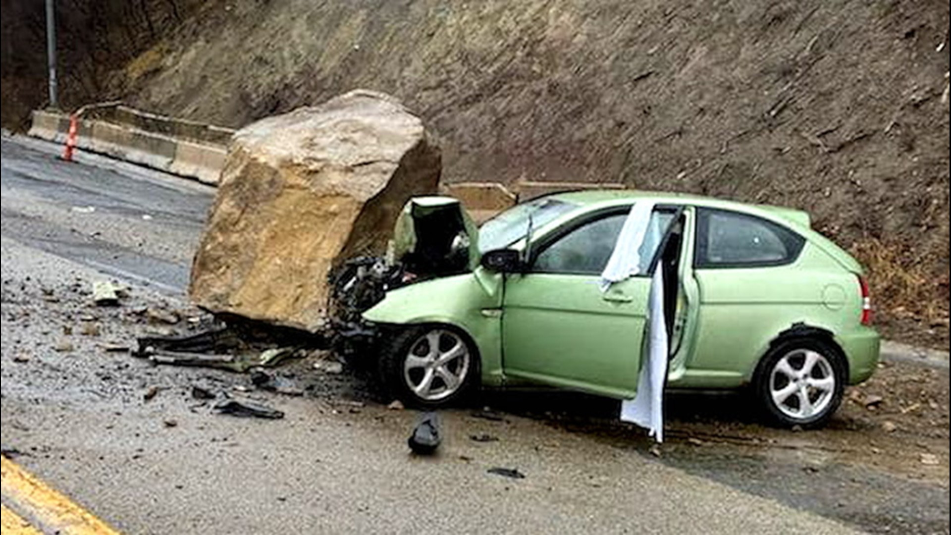 Boulders crush vehicles during rockslide, injure 3 people