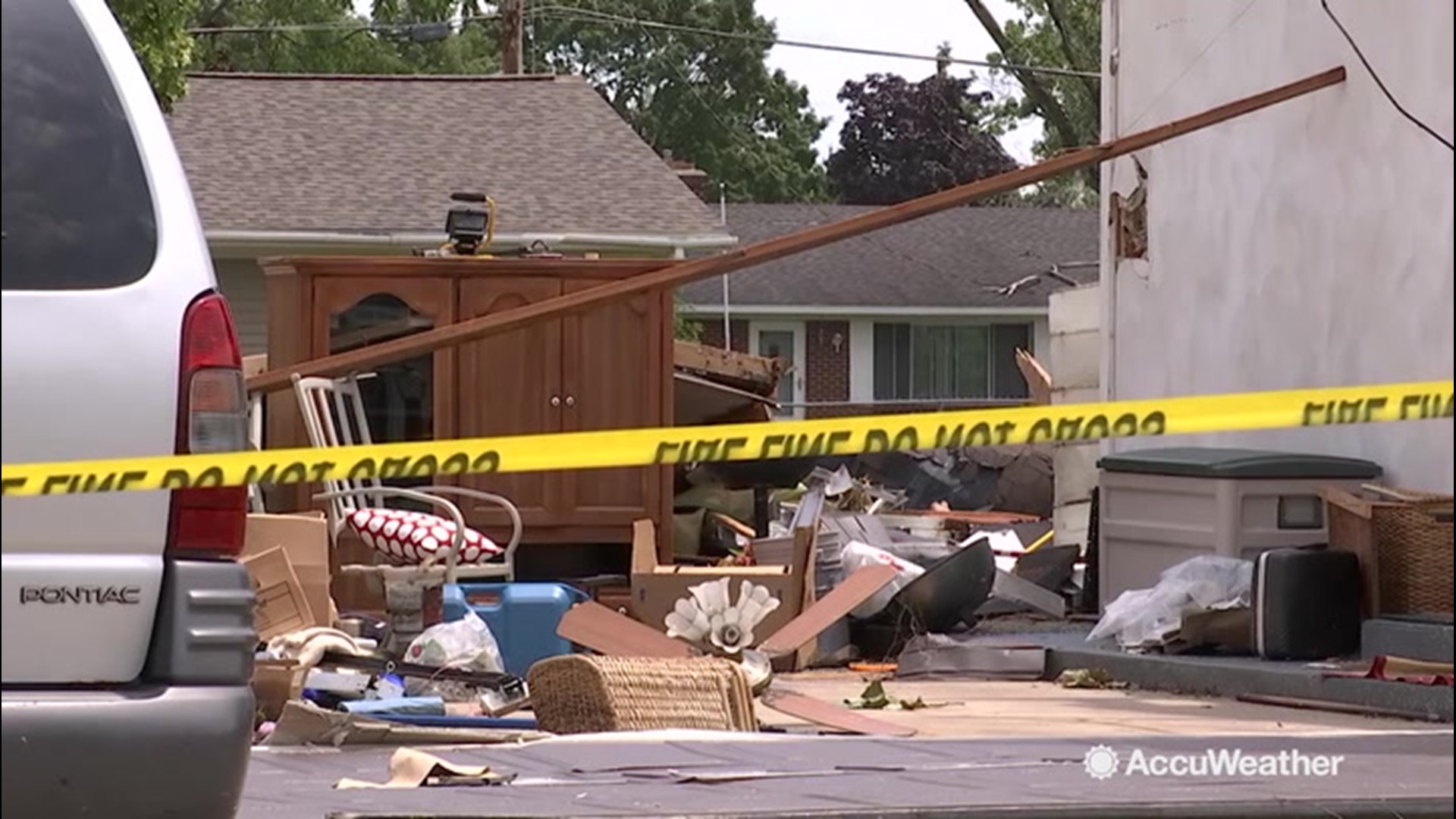 A microburst rocked the town of Jenison, Michigan on July 20, creating winds that downed trees and caused severe structural damage to homes.