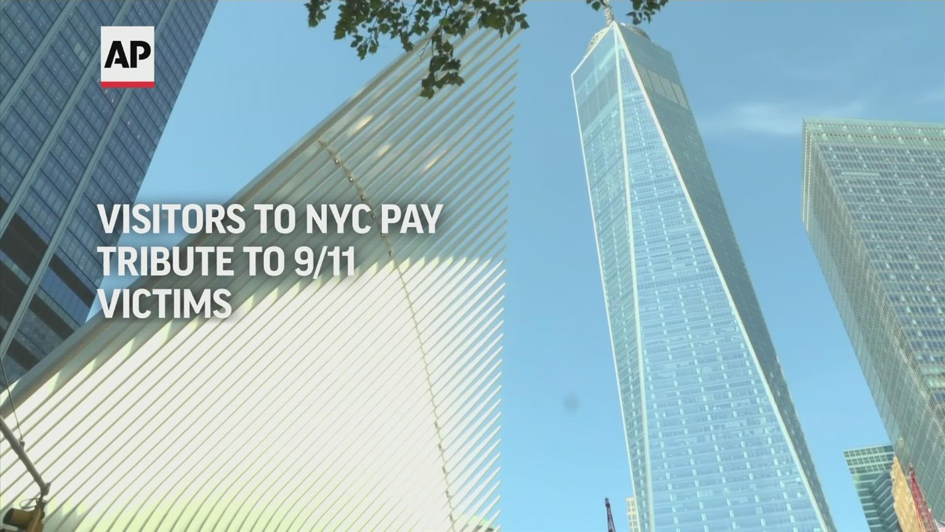 Visitors to lower Manhattan described a feeling of loss and thankfulness on the 20th anniversary of the 9/11 attacks.