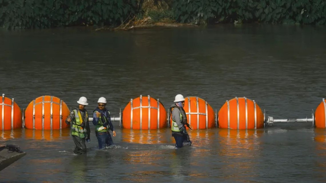 DOJ threatens to sue Texas over floating barriers in Rio Grande ...