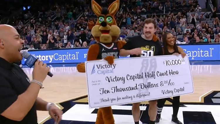 Video: Firefighter wins $10,000 with half-court shot at Spurs game