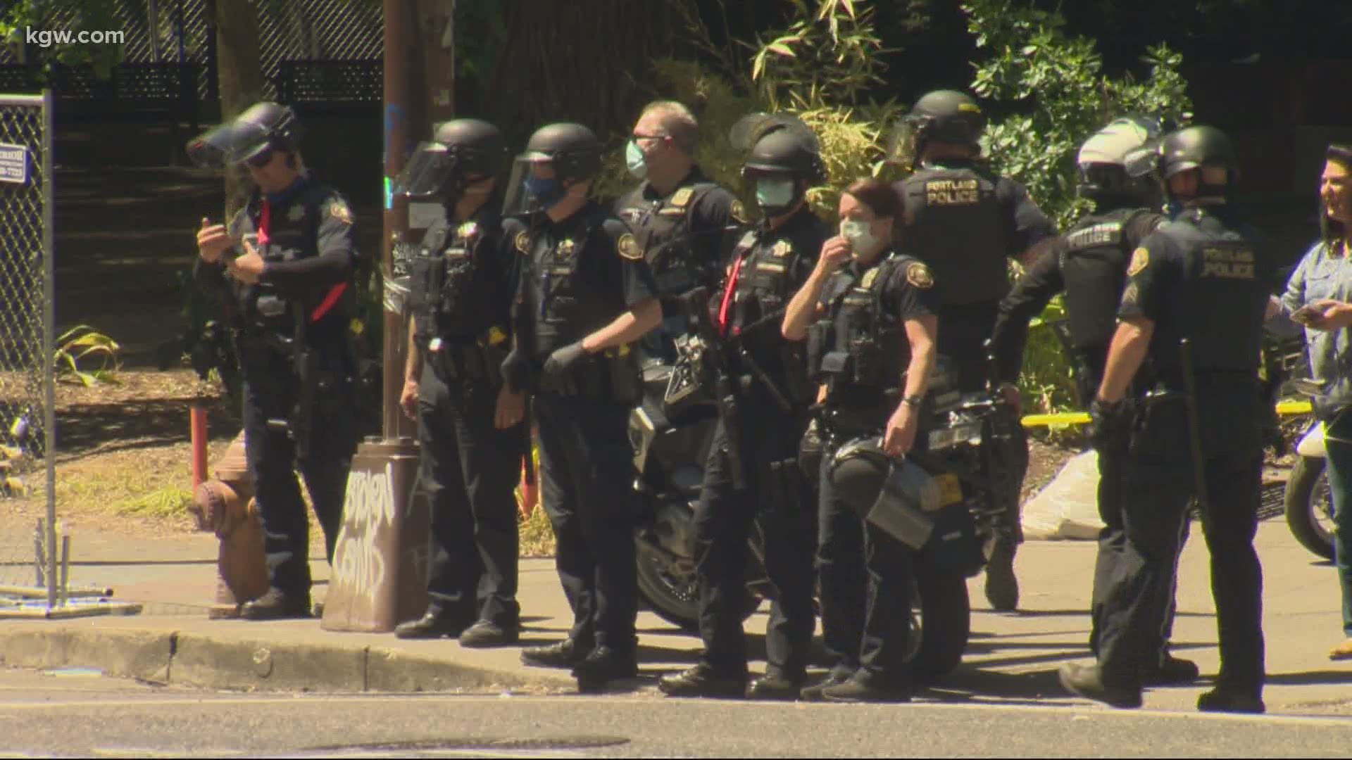 Portland police ordered a group of demonstrators to leave Chapman Square and Lownsdale Square parks early Thursday morning.