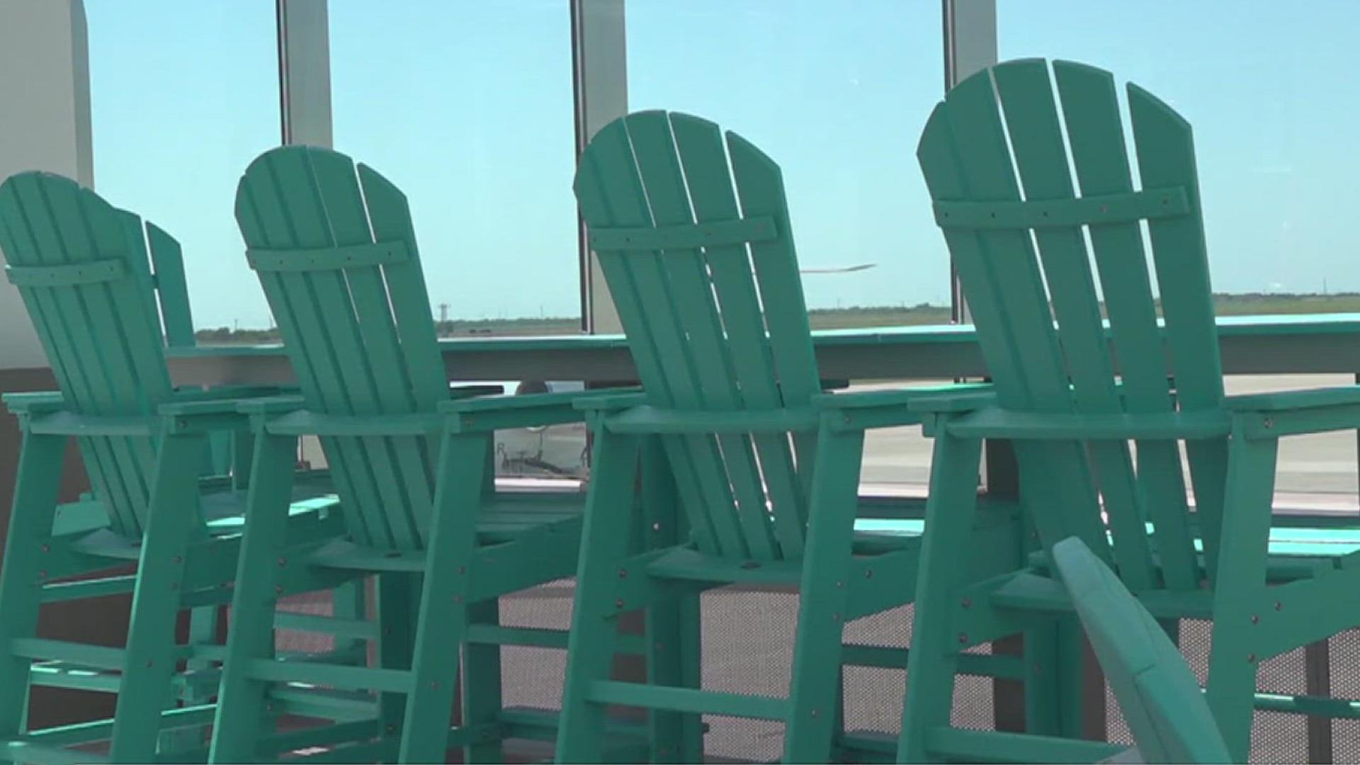 Patrons are able to watch planes come and go from the outdoor patio that comes complete with a 'relief' station for pets.