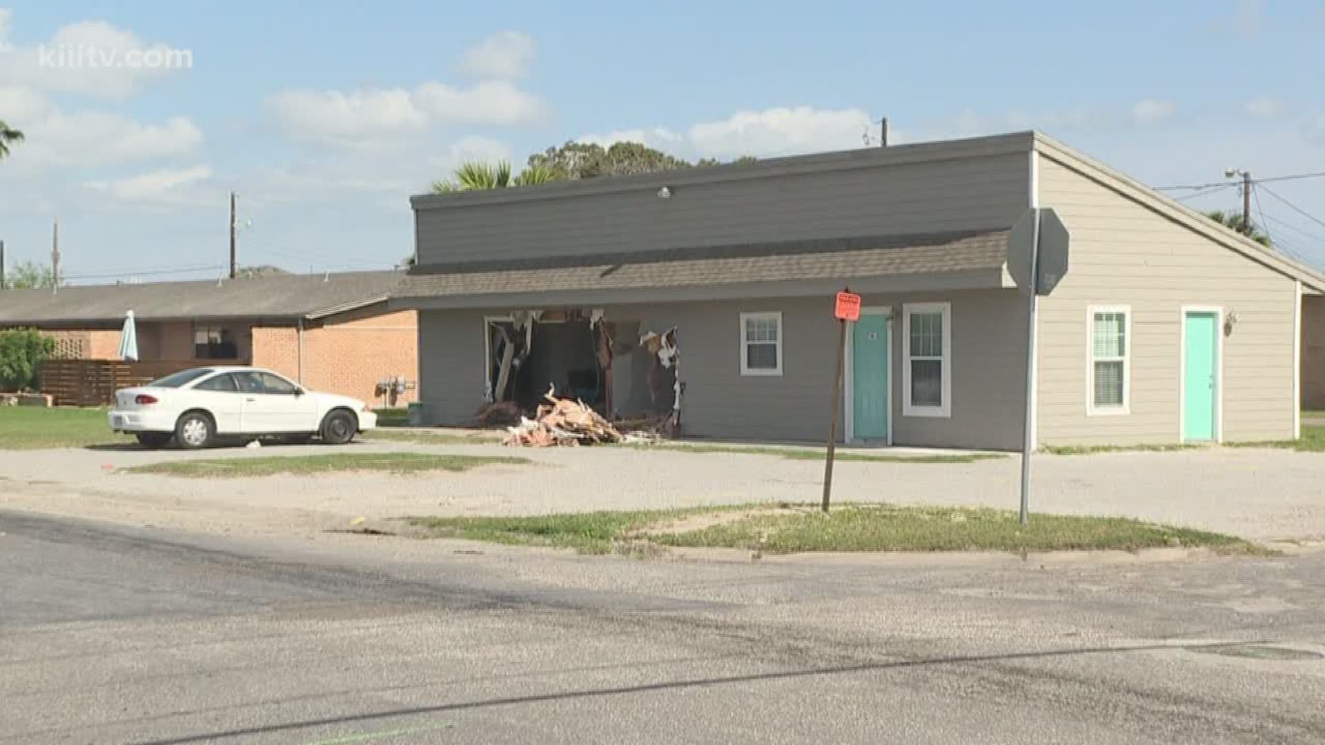 A family in Flour Bluff was trapped in their home for some time Wednesday morning after a vehicle crashed into their apartment complex.