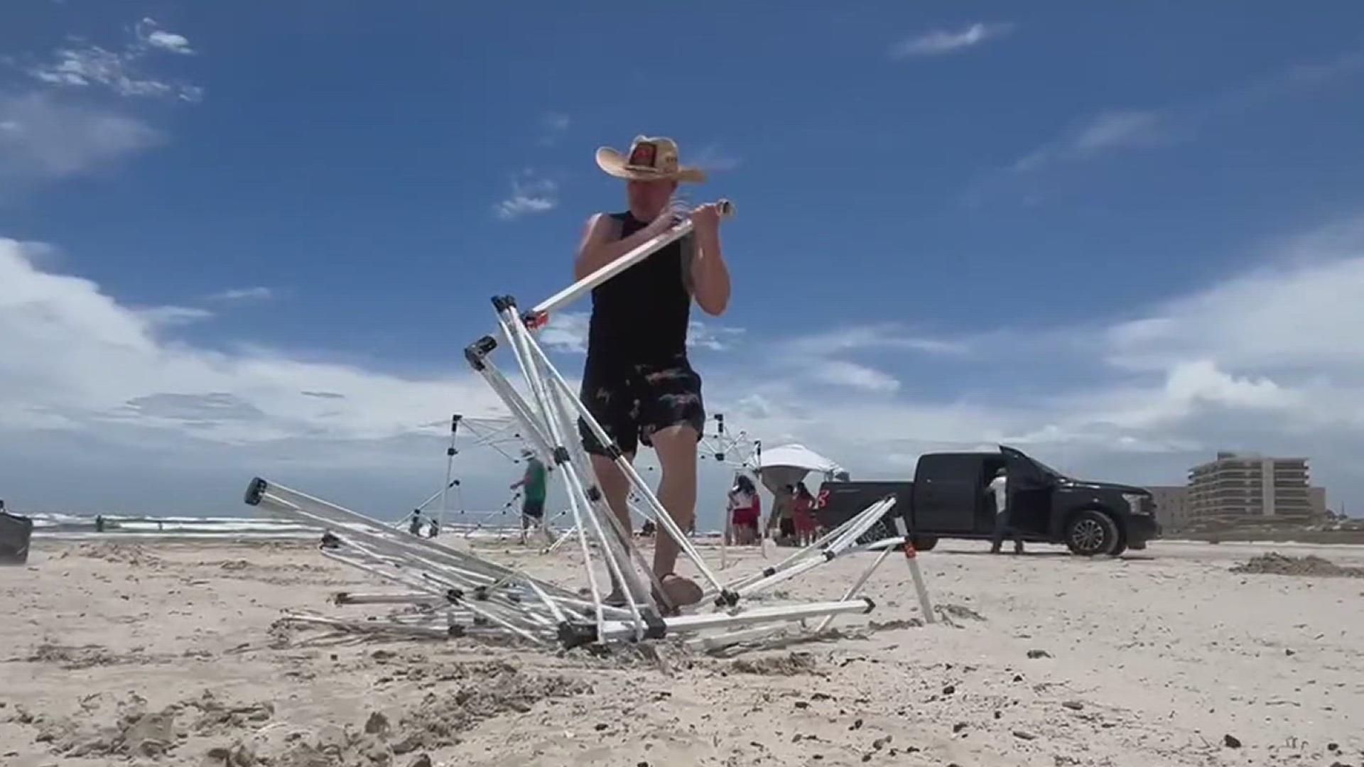 Windy conditions from Tropical Depression Barry surprised beachgoers out on Padre Island and had visitors chasing down their umbrellas Sunday.