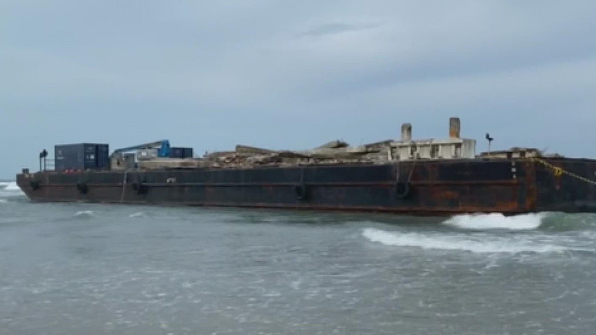 The director of Nueces County Coastal Parks said the barge poses no safety or environmental threat and they should be able to get it back in place when tides rise.