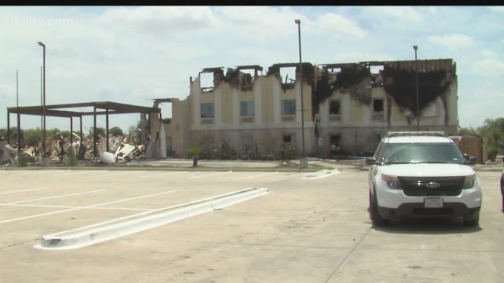 The owners of the Holiday Inn Express in Falfurrias, Texas, were out salvaging items from the hotel Monday after it was destroyed in a fire.