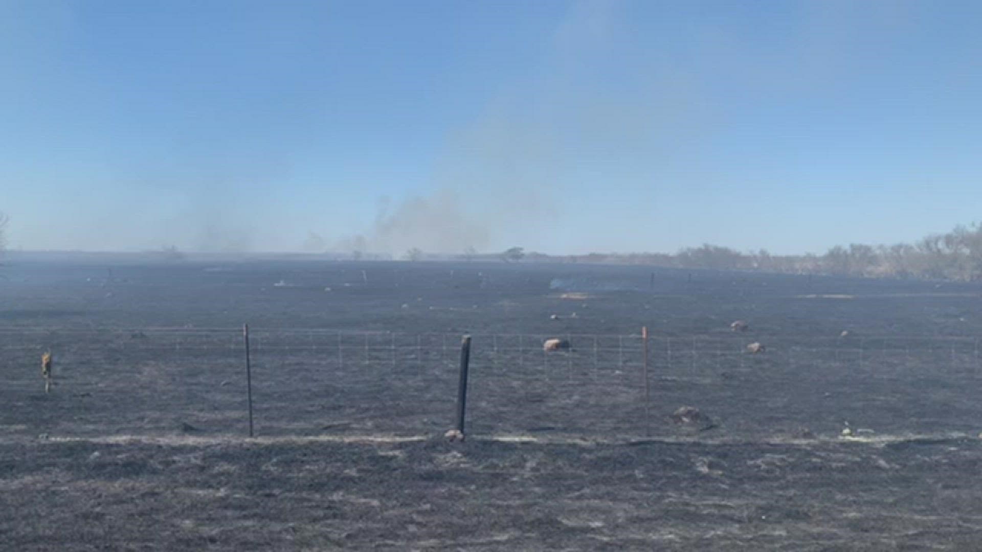 Firefighters in Sinton are battling a major grass fire off Highway 77 and Farm-to-Market 1945.