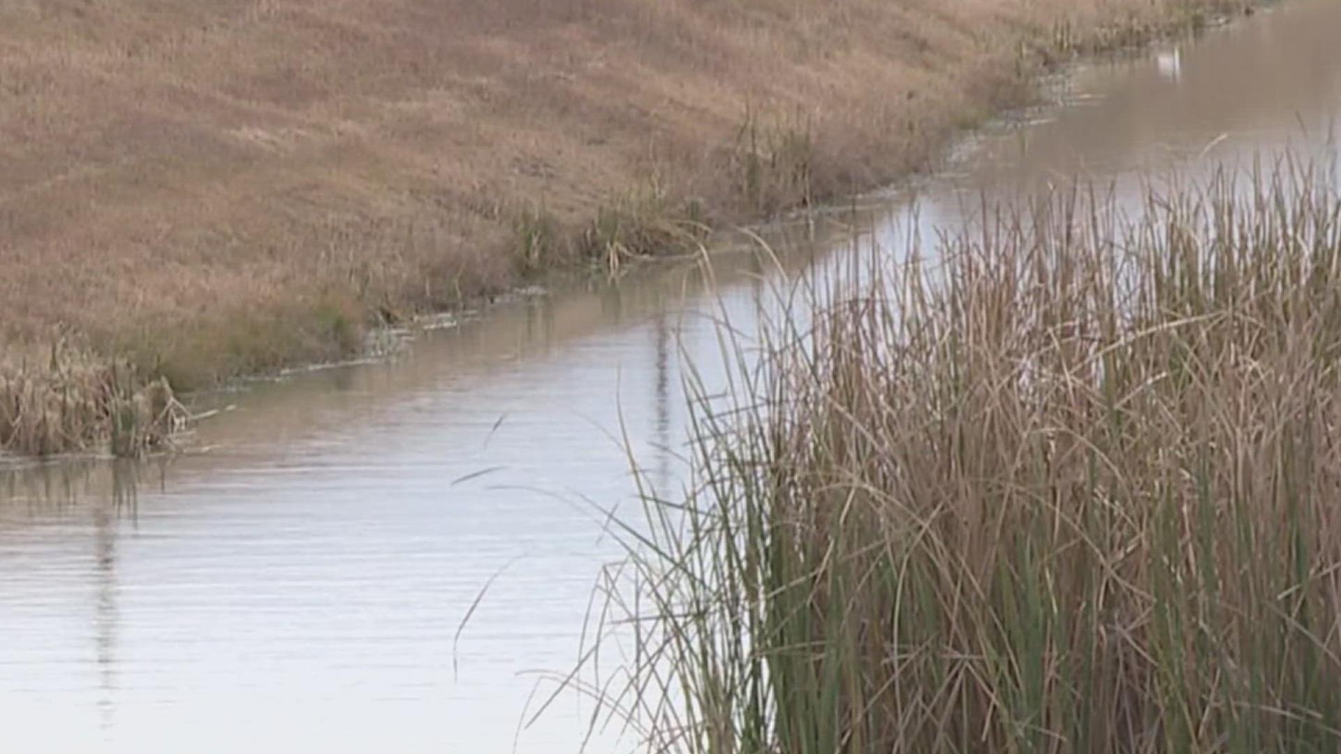 The fires aim to clear land for the creek's drainage improvement project.