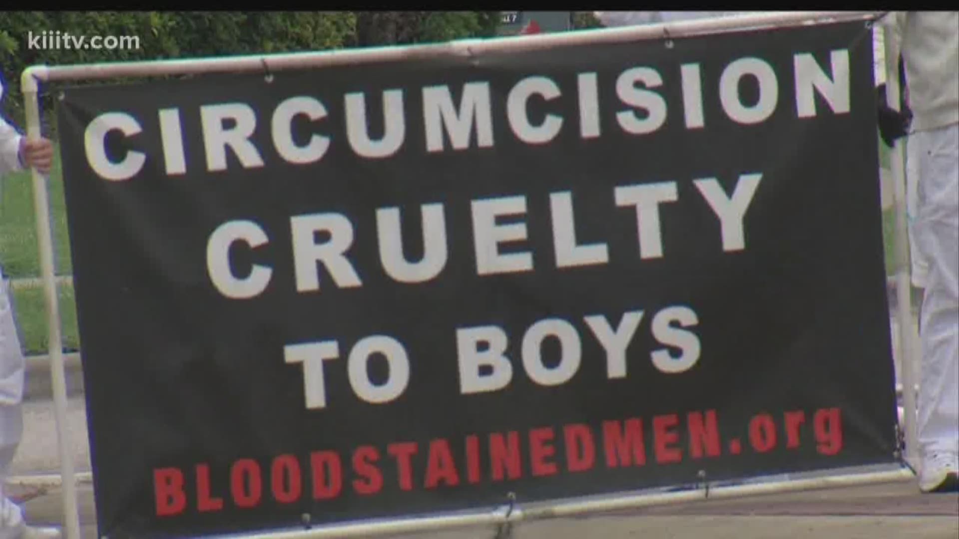 Group takes to street to protest circumcision