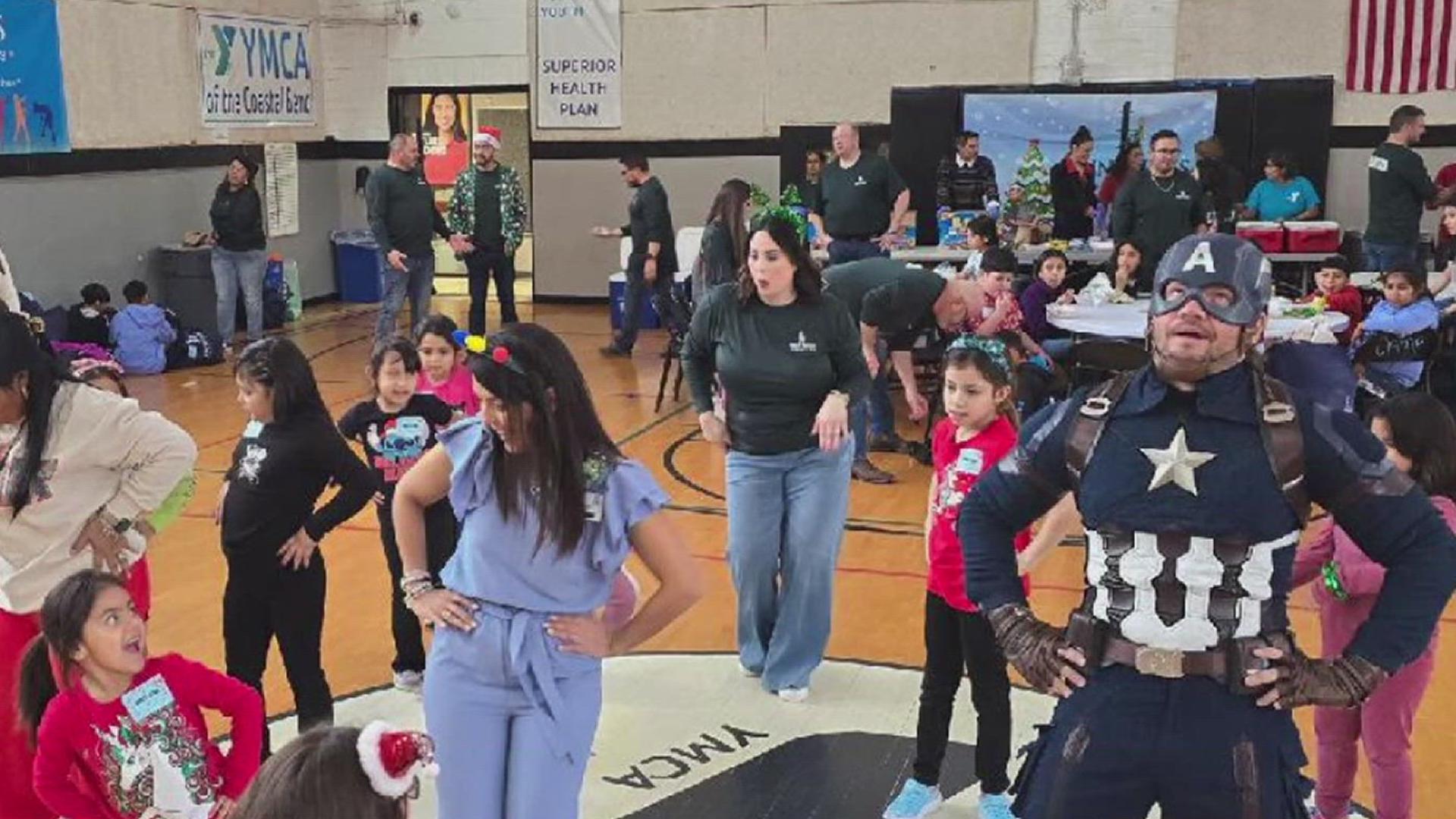 Over 100 local elementary students were gifted shoes, hoodies, toys and socks.  