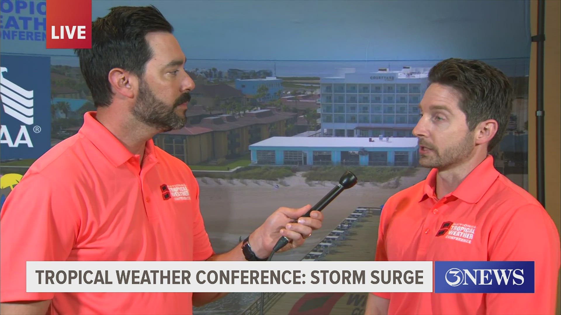 Chief Meteorologist Alan Holt talks with storm surge specialist Cody Fritz.