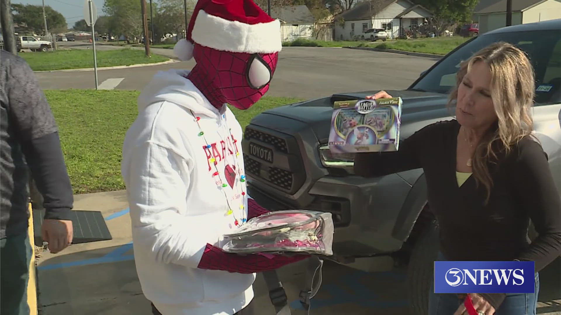 Superheroes spread holiday cheer in Portland with toy drive