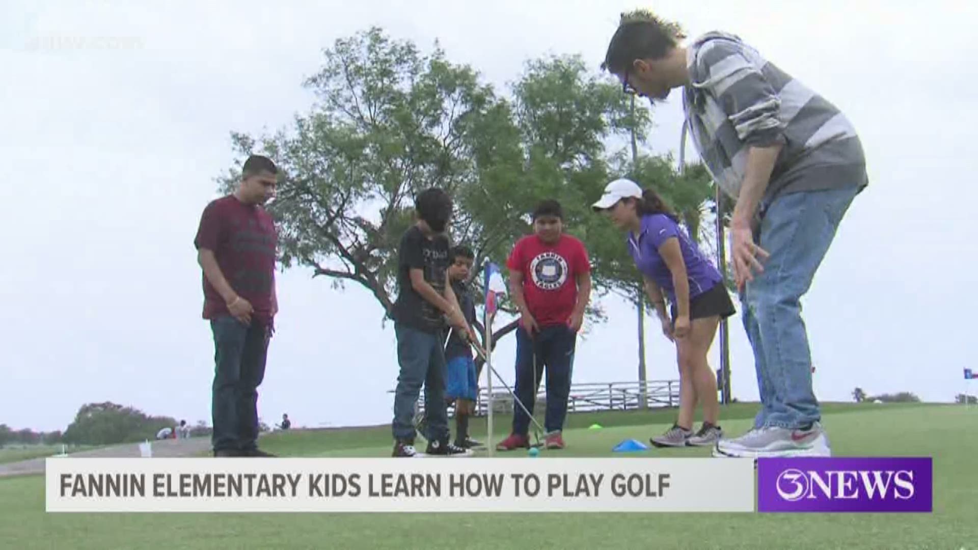 Some students at Moody High School spent their free time volunteering Tuesday to show elementary school students how to play golf.