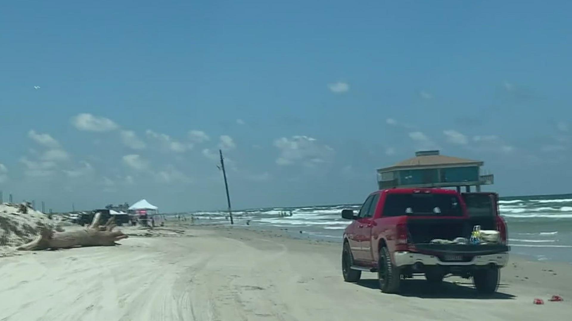 The beach has become so narrow in certain spots that there's only one lane left for traffic!