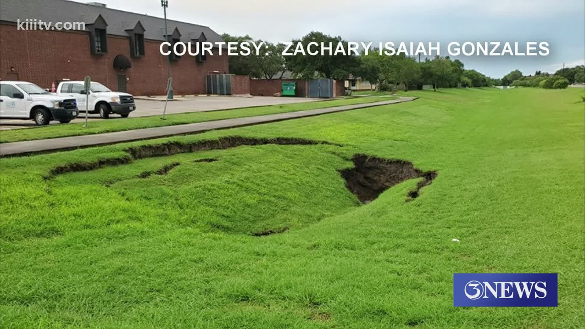 Giant sinkhole forms by the Taylor Center