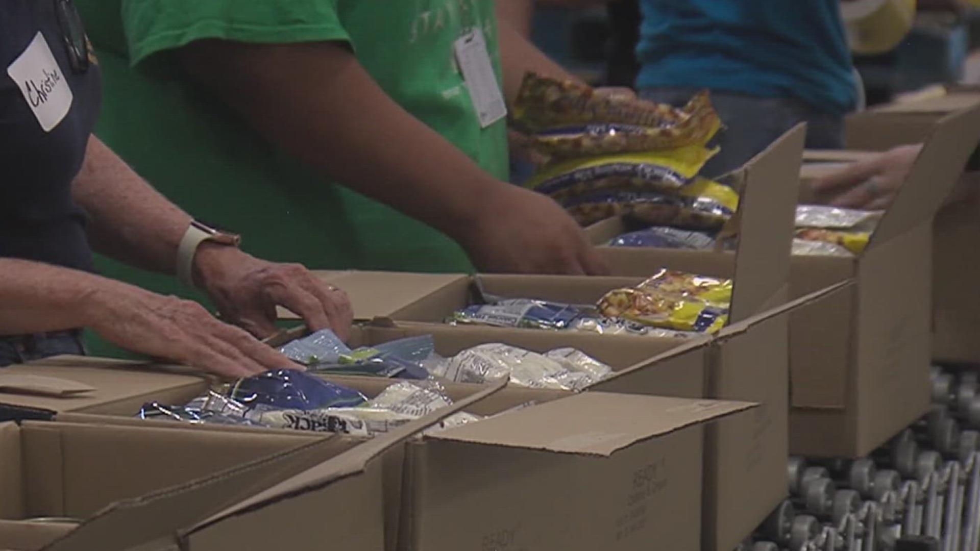 The 1,000 boxes they filled will be distributed to those in need later this holiday season.