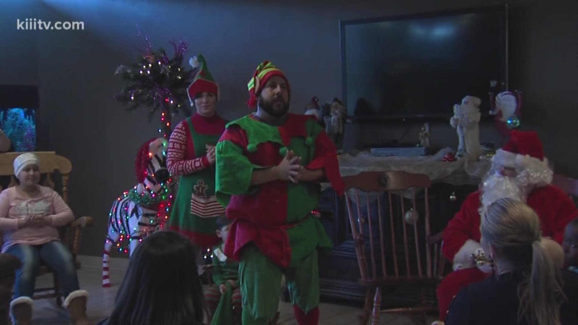 Steve Trevino dressed as an elf to join Santa at the charity to pass out goodie bags to the children and families who call the facility home.