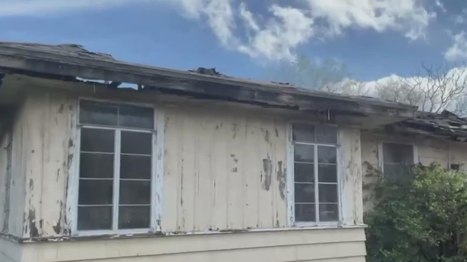 The house a total loss as the roof, doors and windows are all in shambles.