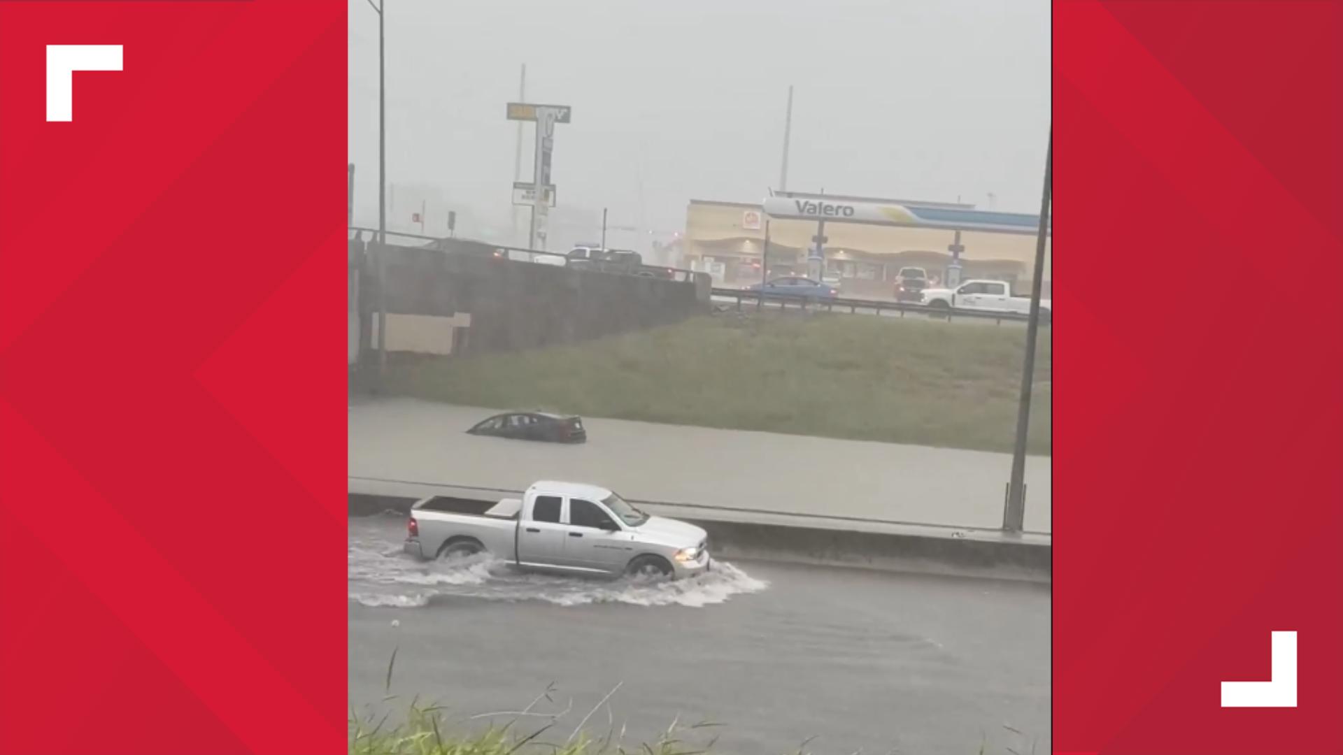 Videos are popping up on social media showing a car underwater on the highway off NPID and Leopard.