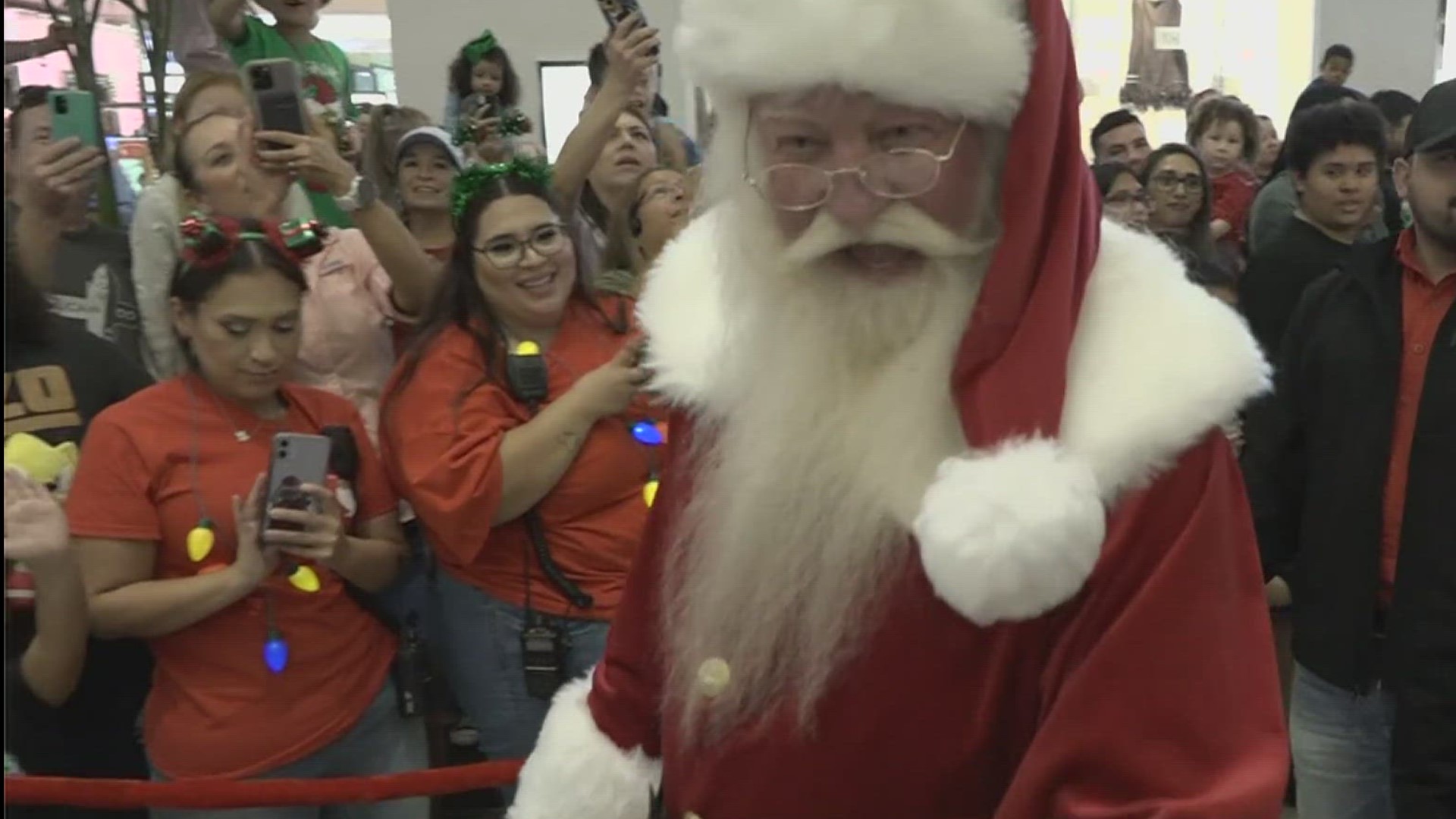 The Christmas pep rally was full of shoppers lining up for a chance to talk to the man in red.