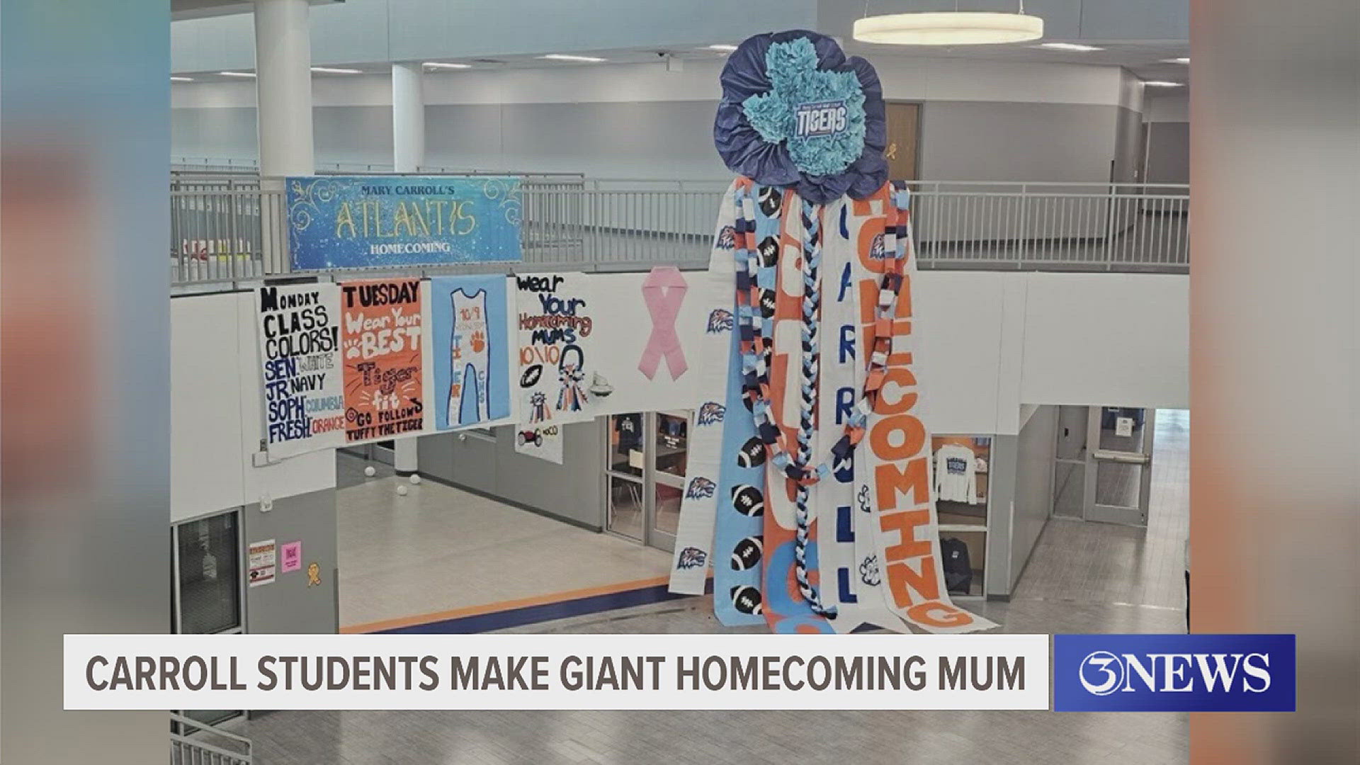 Just look at how tiny the students look standing next to the huge mum!