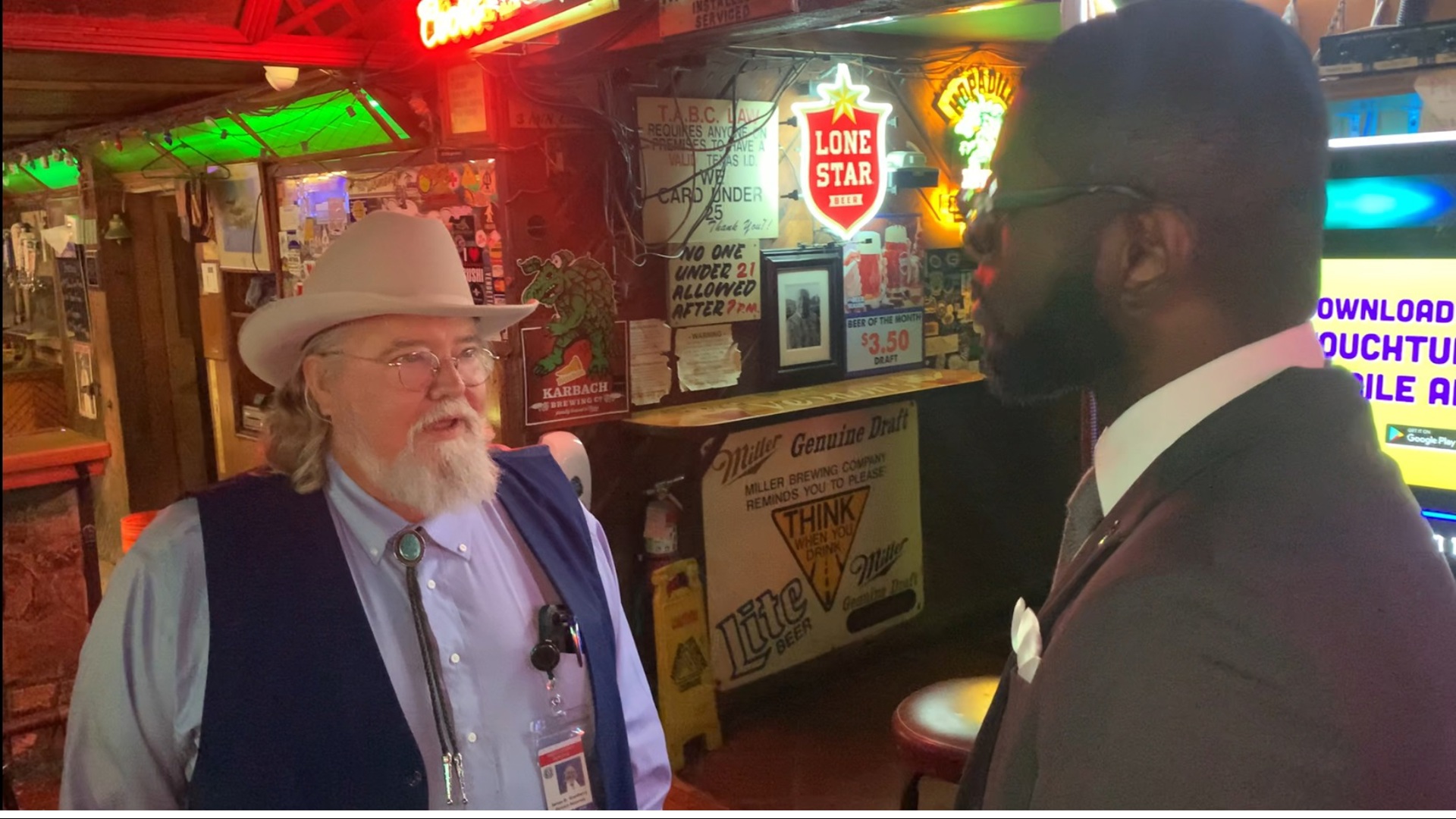 Nueces County DA Jimmy Granberry talks with Josh Maxwell as he waits for results to come in Tuesday.