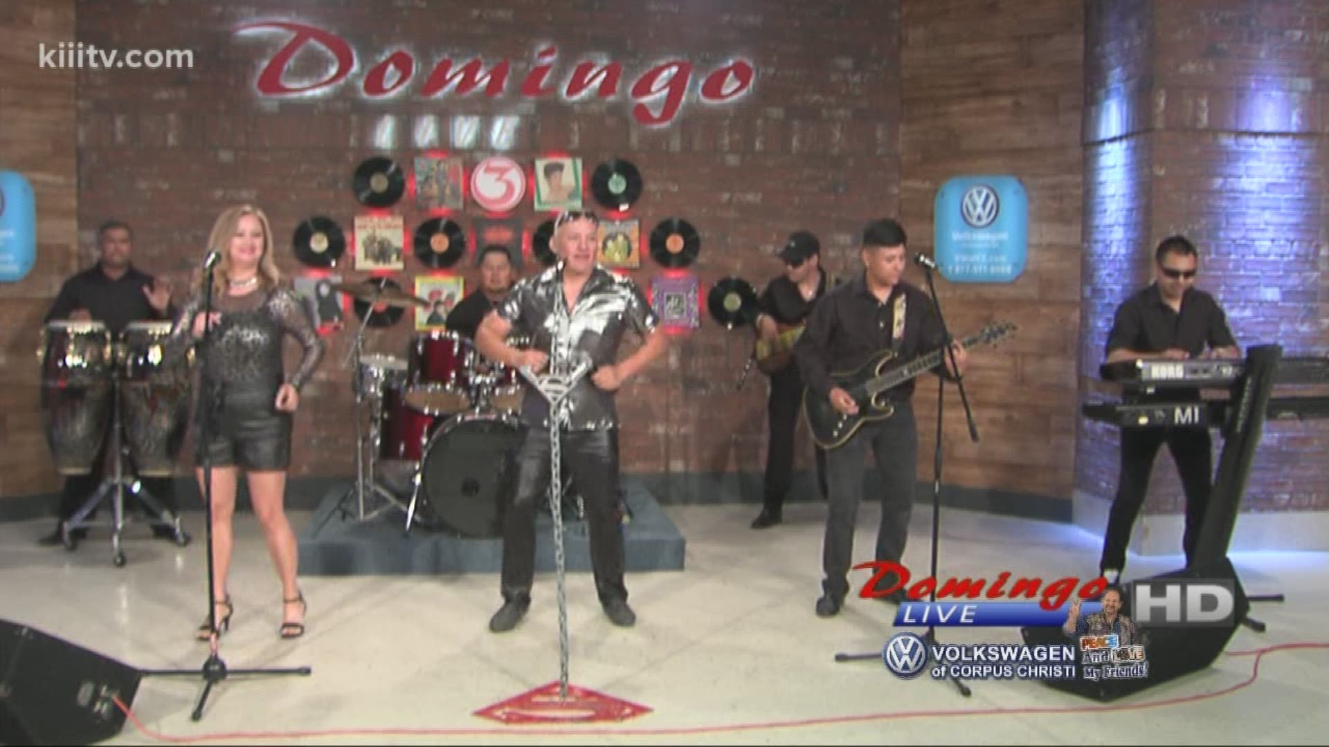 Super Sueno performing "Cumbia Contagiosa" on Domingo Live.