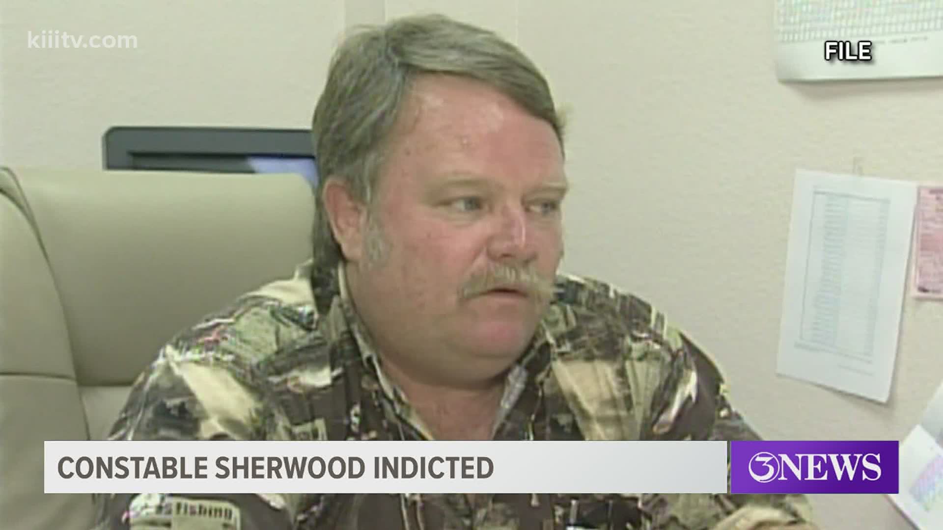 Robert Sherwood was accused of accepting a bribe from a witness in an assault case in order to have the complaint dismissed.