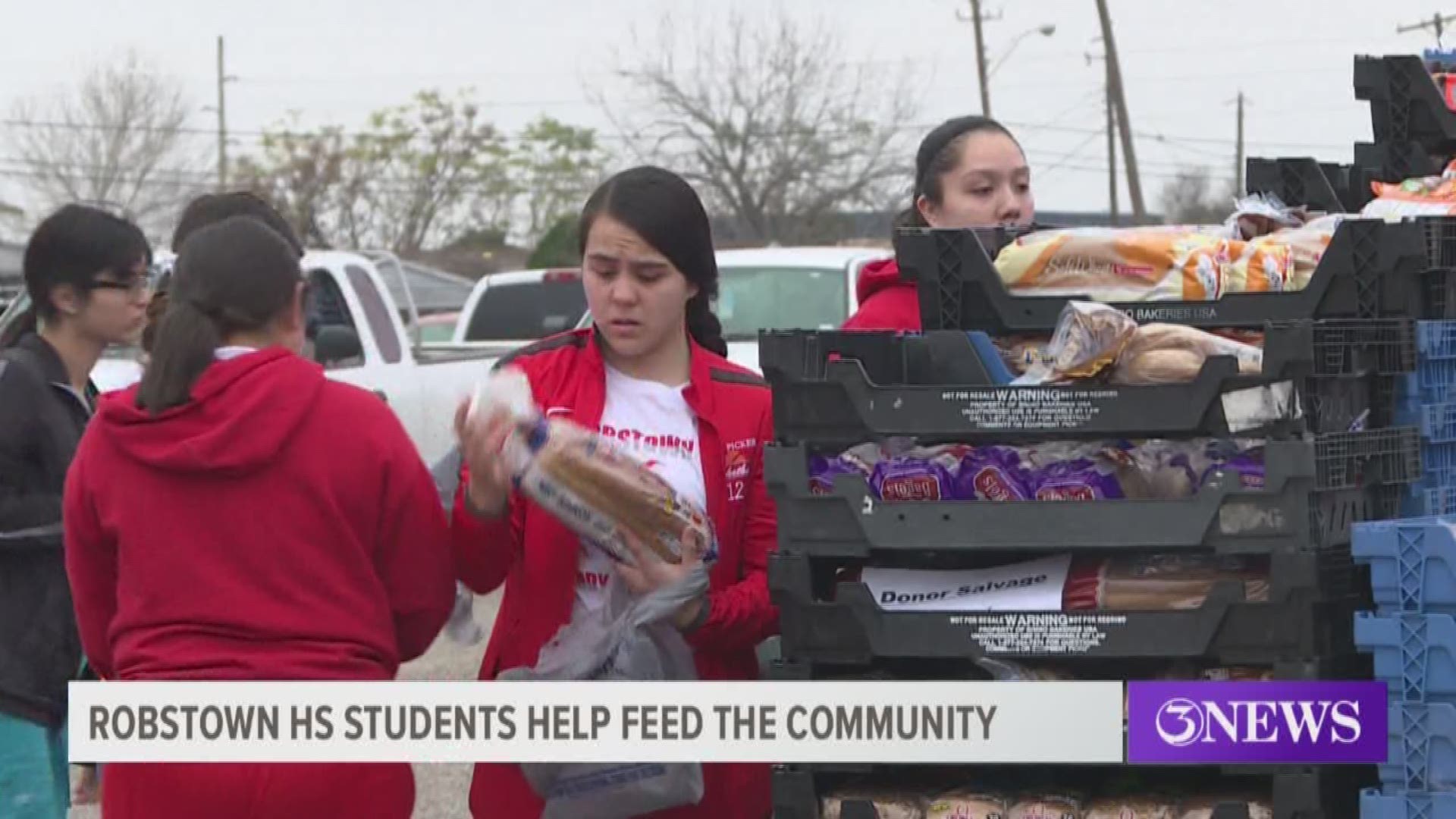 The scene today outside the Cotton Picker Stadium was lively, as students from various student organizations were there to hand out food to anyone in need.