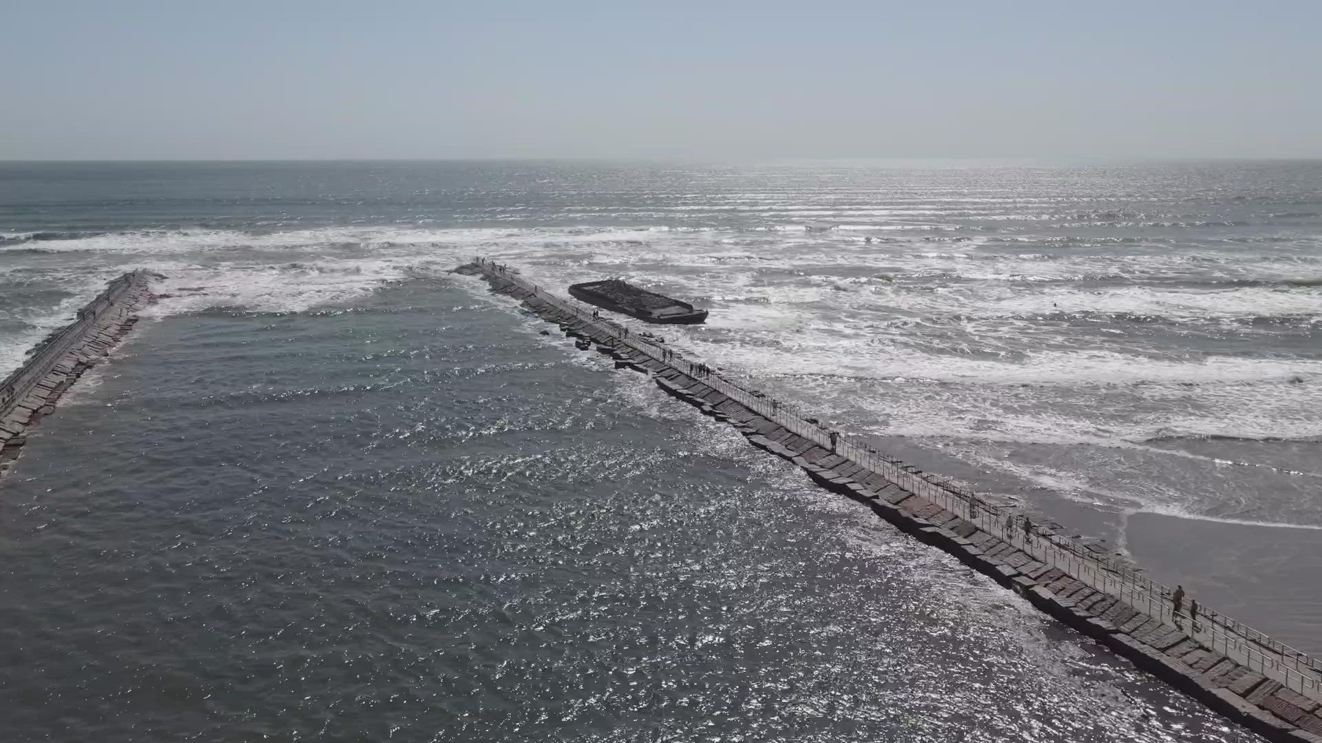 The Coast Guard said they are aware of the barge near the jetties.