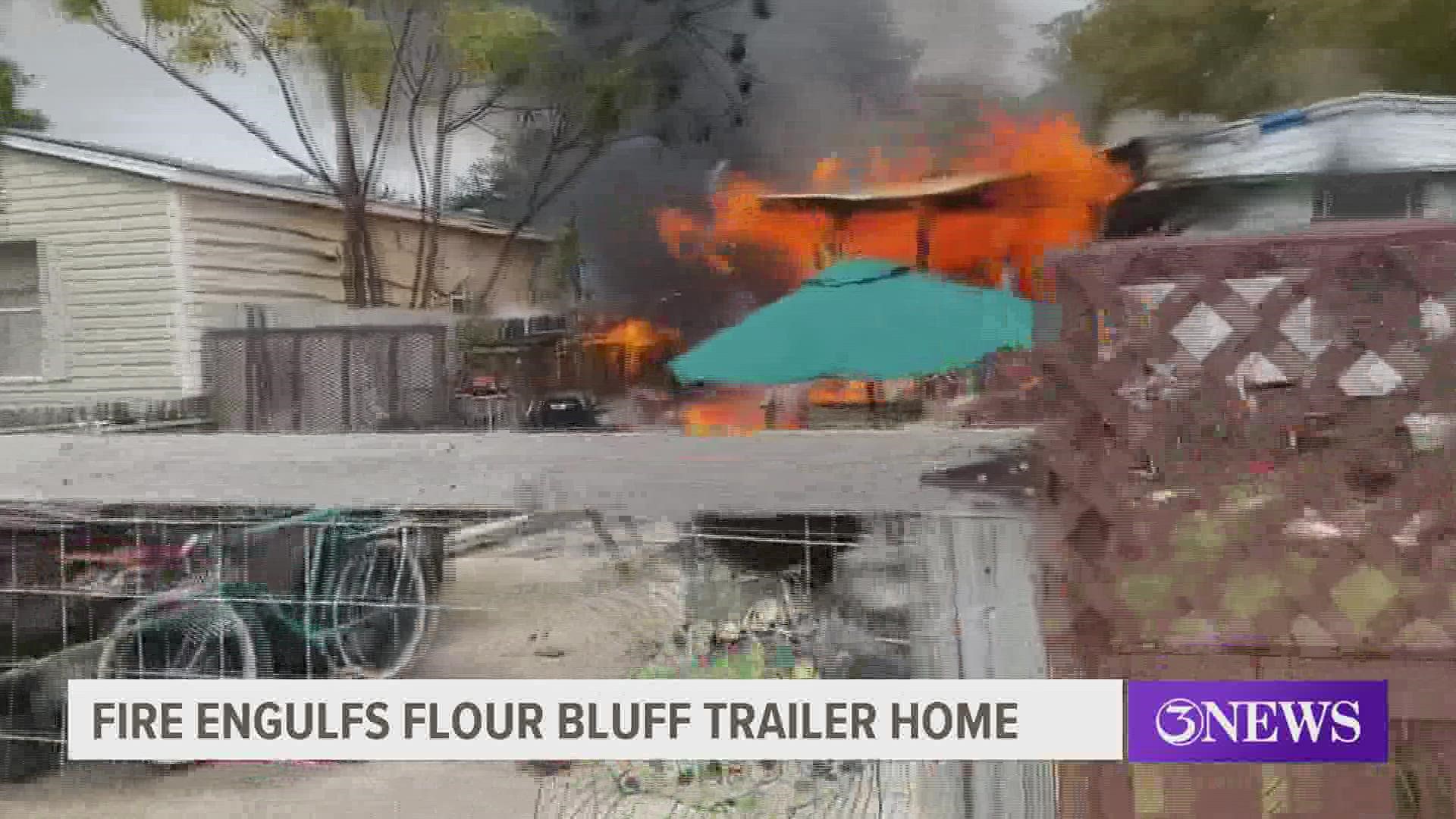 Flames could be seen coming from the front of a trailer home on the 2900 block of Islander Dr. just after 10:30 a.m.