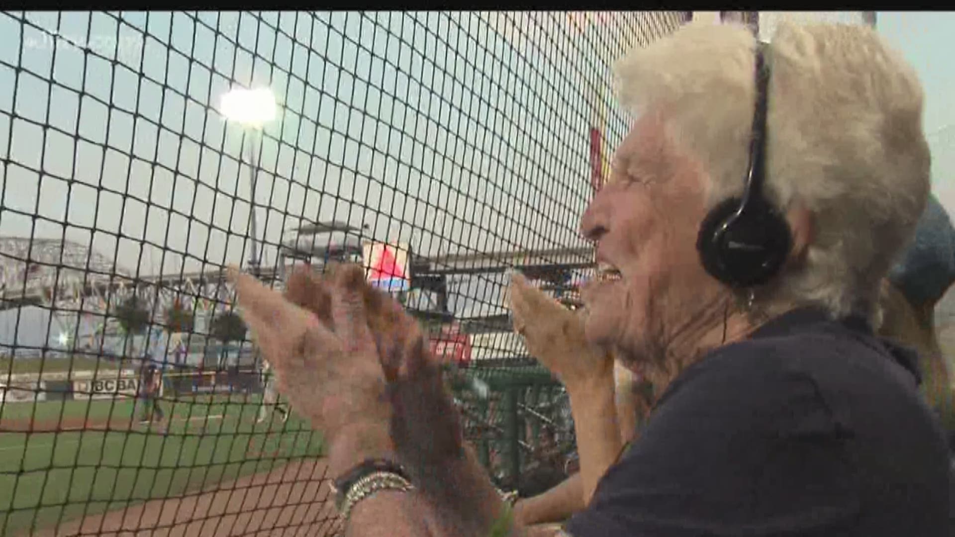 The 85-year-old fan doesn't miss a play. She keeps track of every hit, run and error, while adding a little of her own commentary along the way.