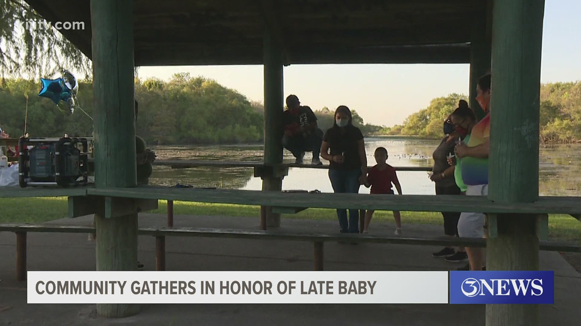 Community members came together for a small prayer vigil in memory of a baby boy who tragically died last week.