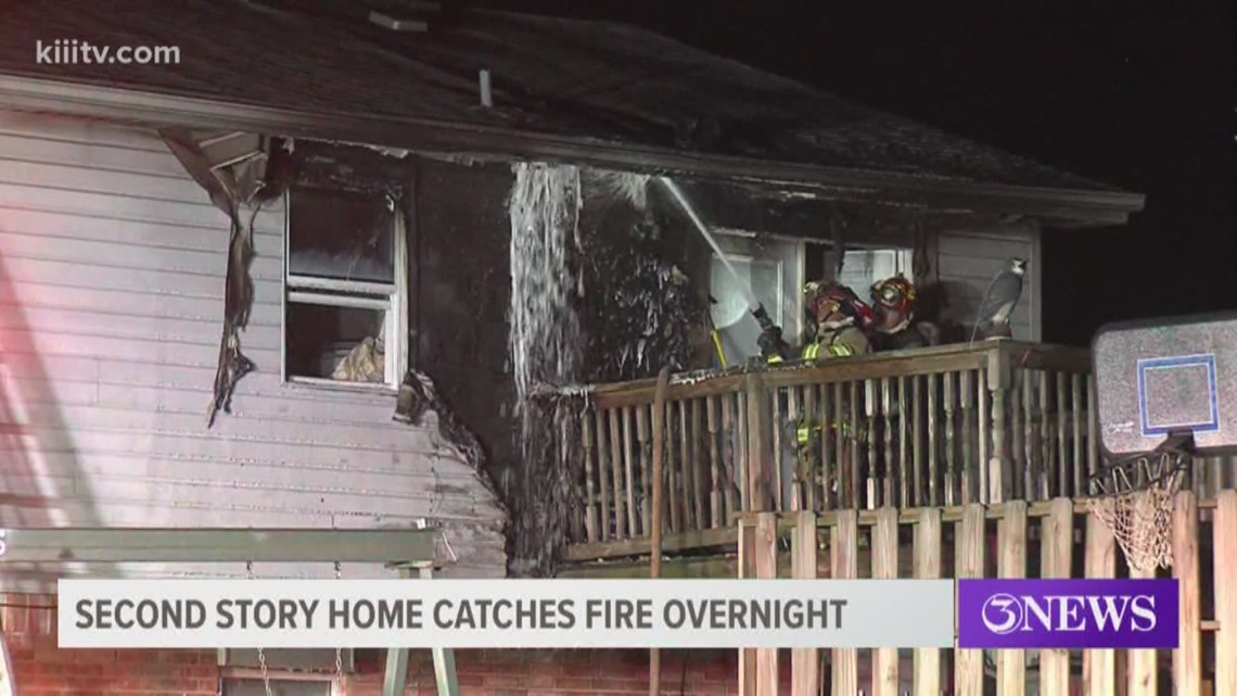 Two story home catches fire overnight