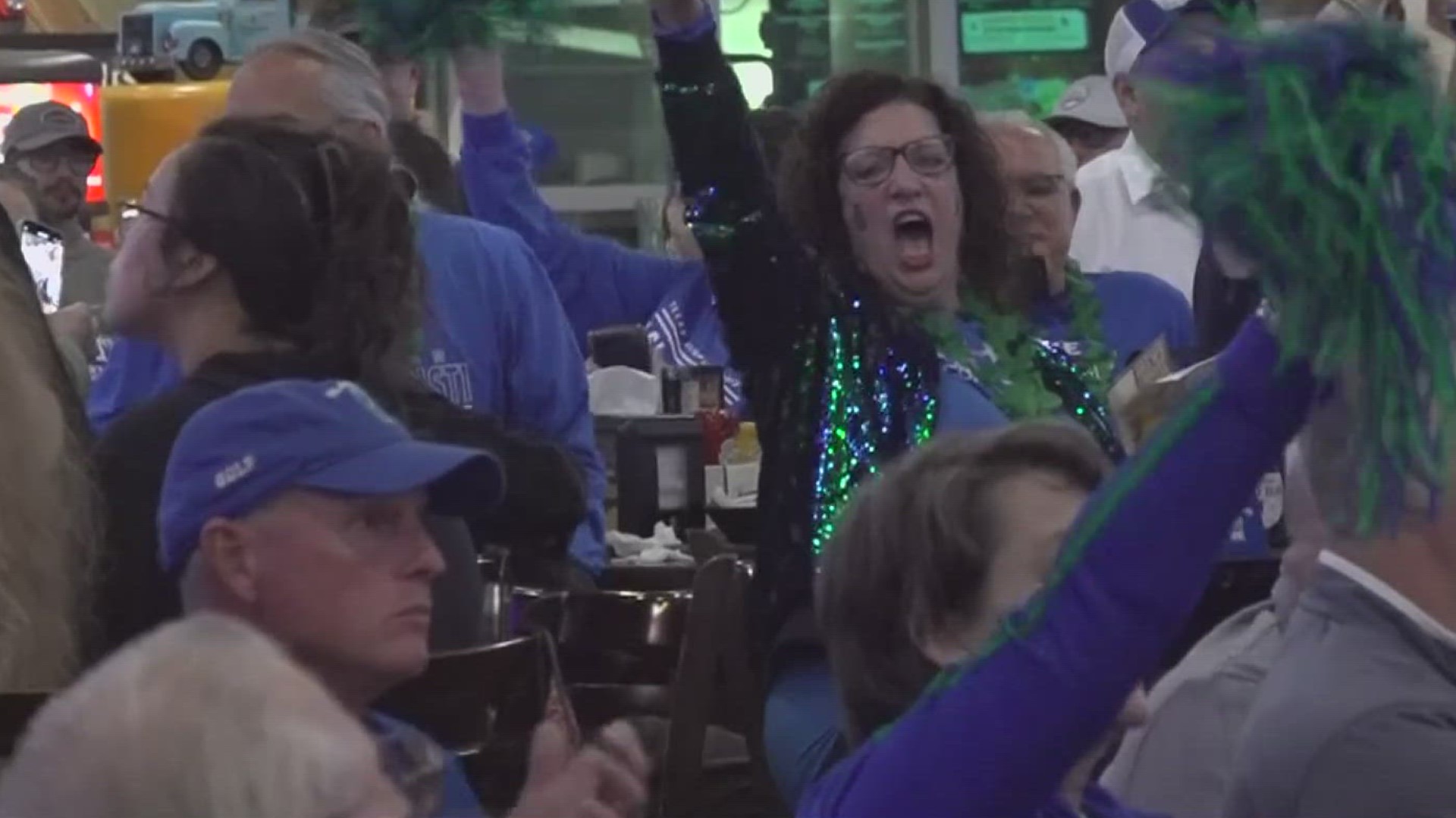 Throughout the watch party, shakas were up in the sea of blue and green as islander alumni and students alike joined together to show their support.