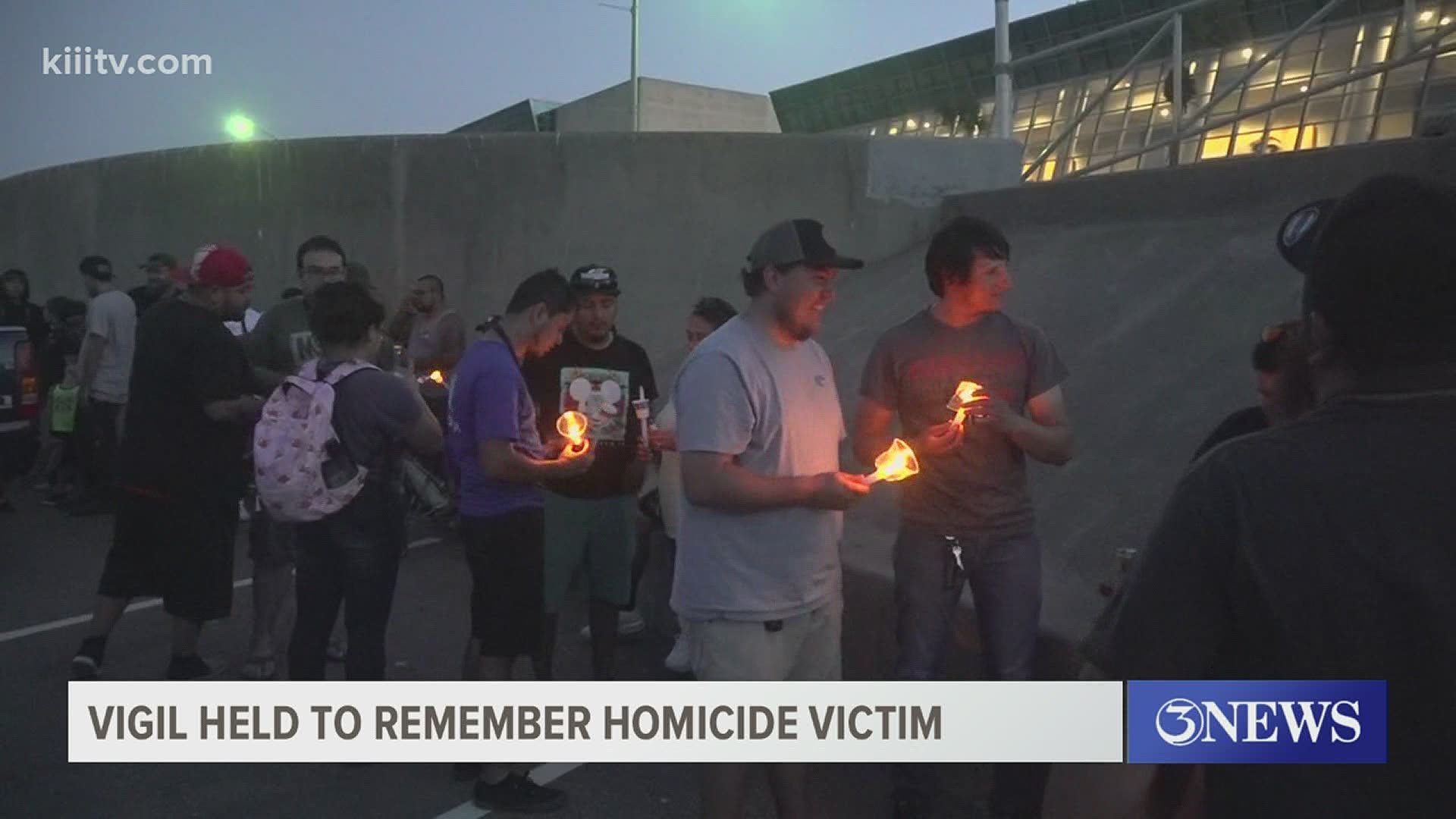 Friends and family gathered Sunday night in front of the American Bank Center.
