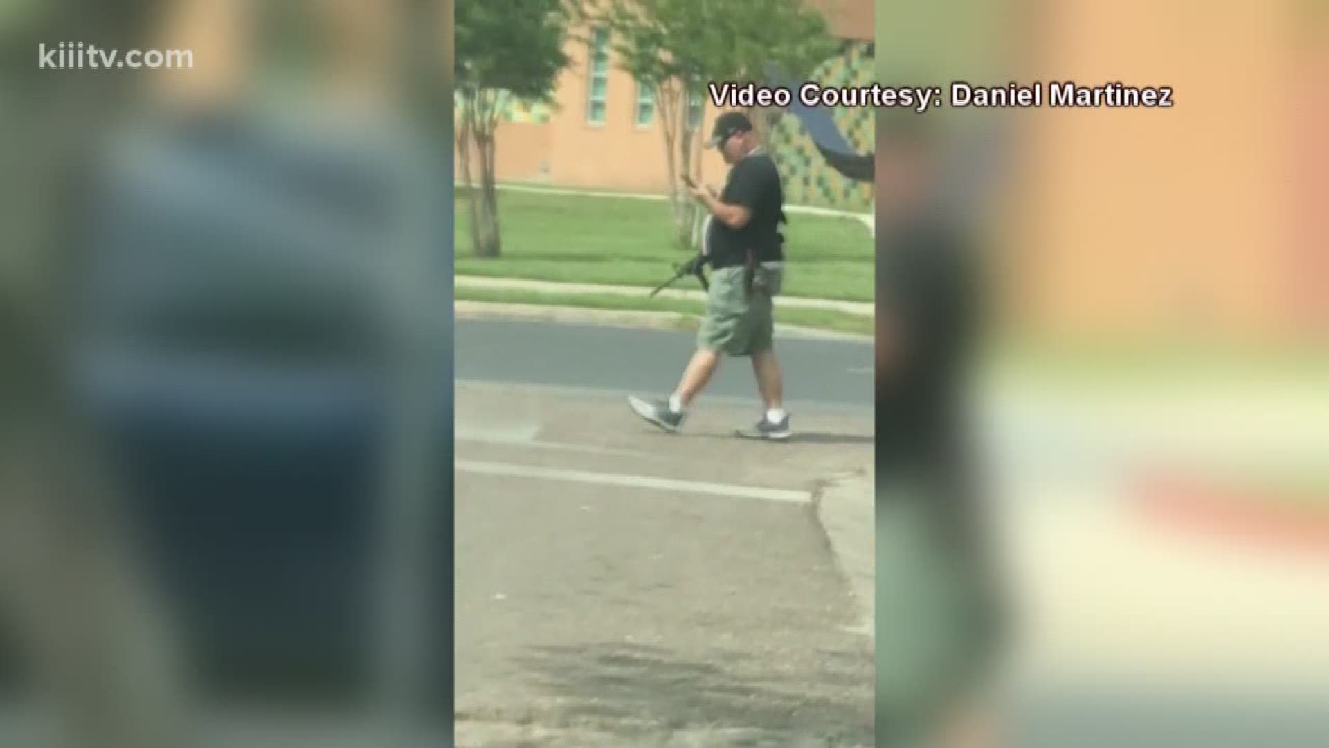 It was a sight that sparked safety concerns for parents and caused an elementary school to go on lockdown Tuesday afternoon – an armed man walking adjacent to the campus.