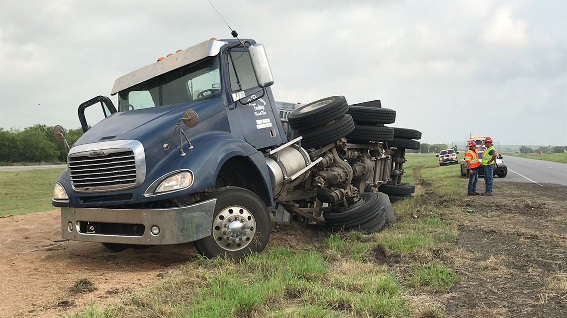 Truck driver falls asleep at the wheel, loses full load of grain along ...