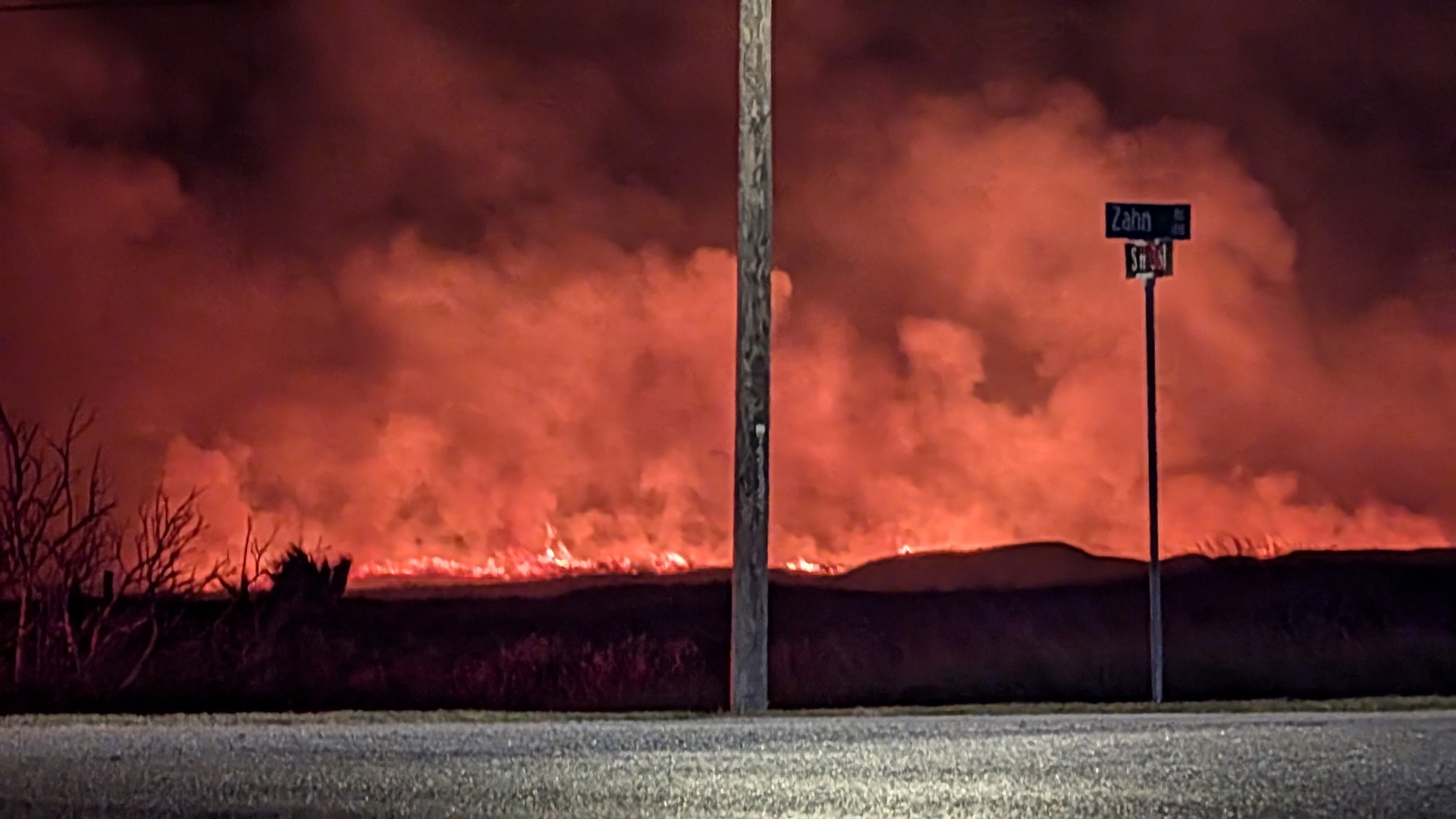 A large brush fire had burned at least 50 acres late Saturday night near JP Luby Surf Park.