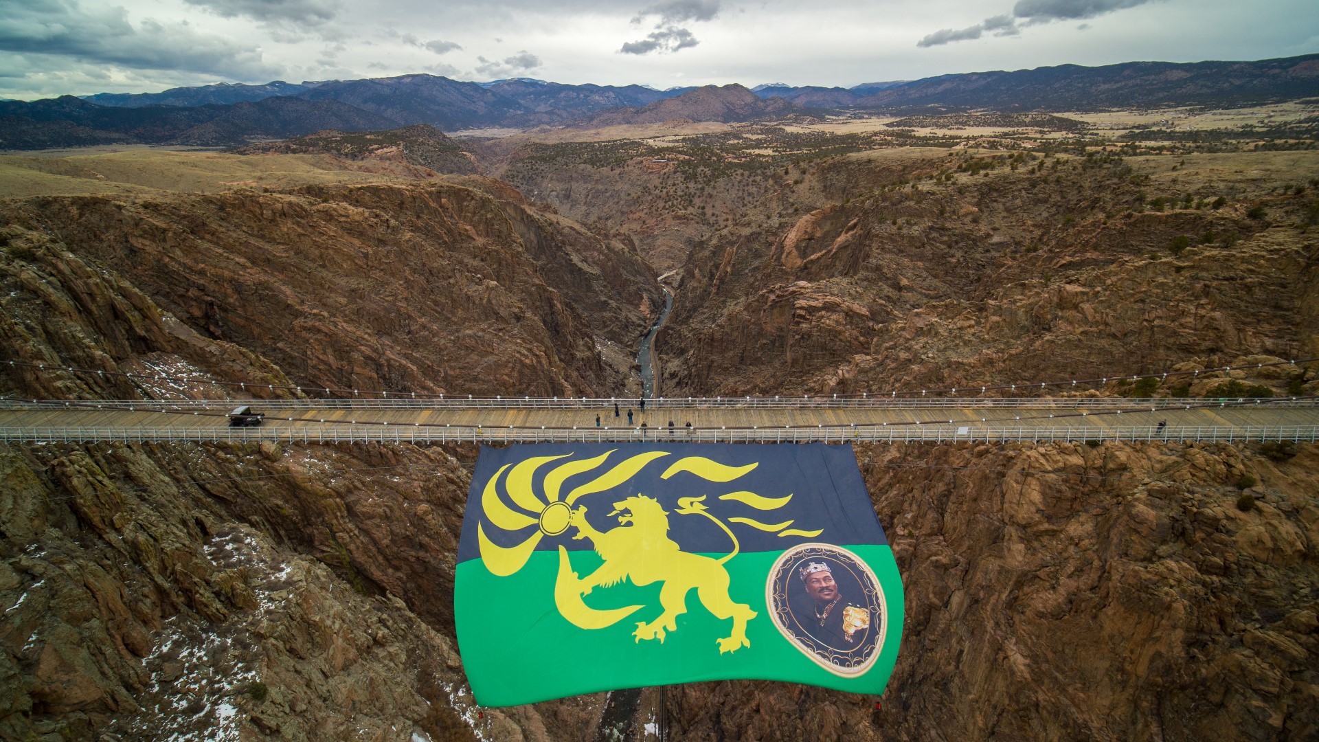 A flag for the new movie 'Coming 2 America' flies at the Royal Gorge Bridge in southern Colorado on Friday, March 5, 2021.