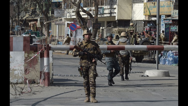 Suicide bomber in ambulance detonates at Afghan checkpoint; 95 dead ...