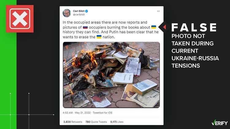 No, a photo of burning books was not taken during current war in Ukraine